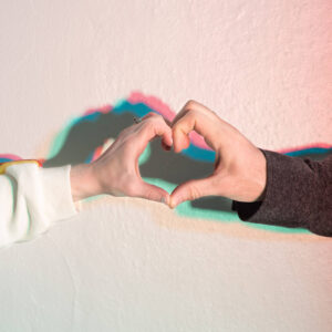 Two hands held together to make a heart